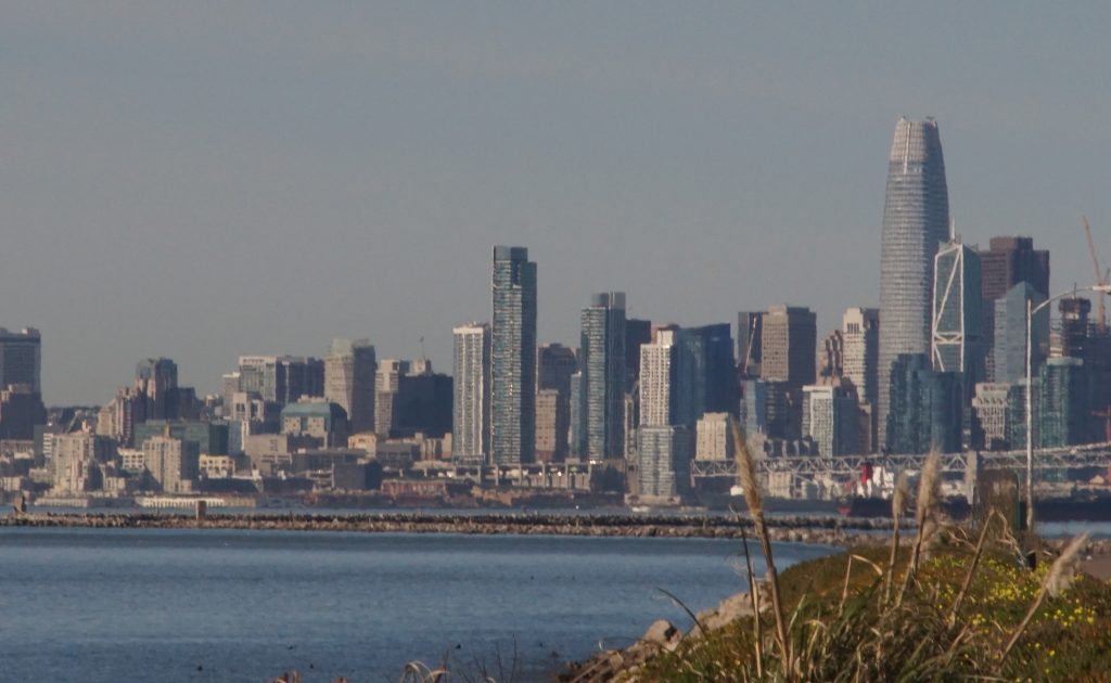 Experts expect another active wildfire season this year in the West. (Alex/Adobe Stock) The effects of heat haze on a city scape