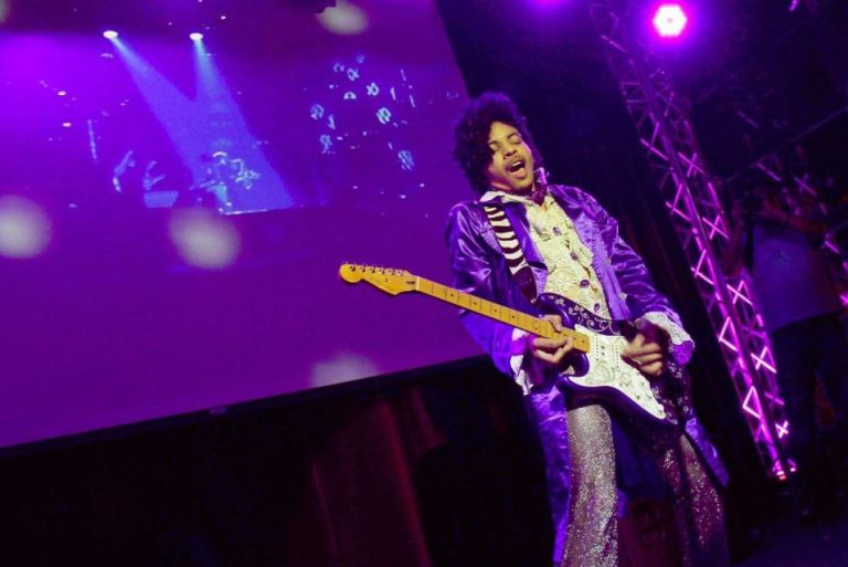 Julian Stephoni performs as Erotic City, a tribute to the late pop star Prince. (Photo courtesy of Erotic City) Julian Stephoni performing on stage as Prince