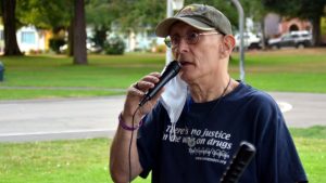 Monte Levin speaks into microphone