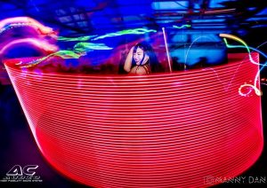 A Flow Artist performs in the crowd at the AC AUDIO Fairgrounds Rave