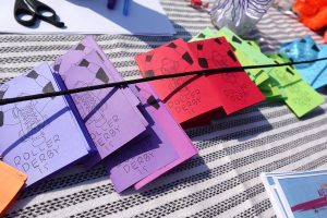 A row of West Sound Roller Derby's "Roller Derby Is" zine