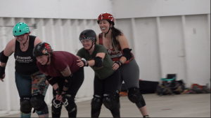 Members of West Sound Roller derby lined up at a recent practice