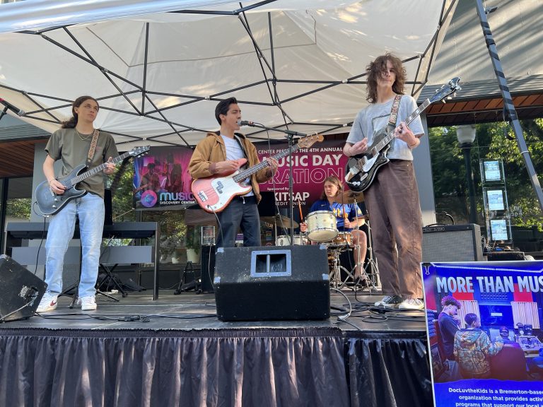 A band playing live music on a stage.